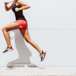 Woman running in athletic wear.