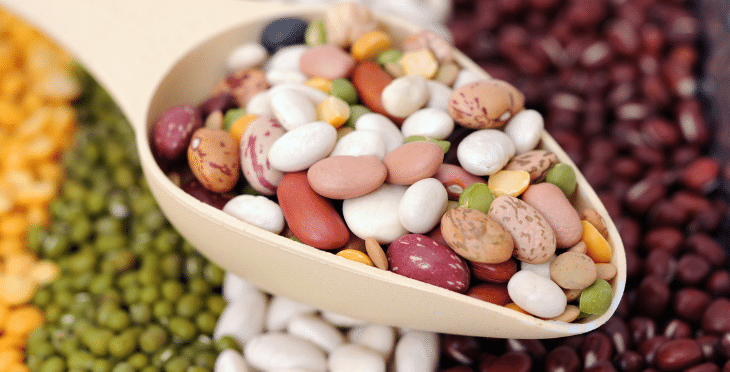 Bowl of mixed beans on a table.
