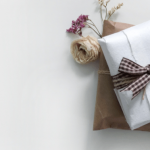 Wrapped gifts with natural twine and dried flowers.